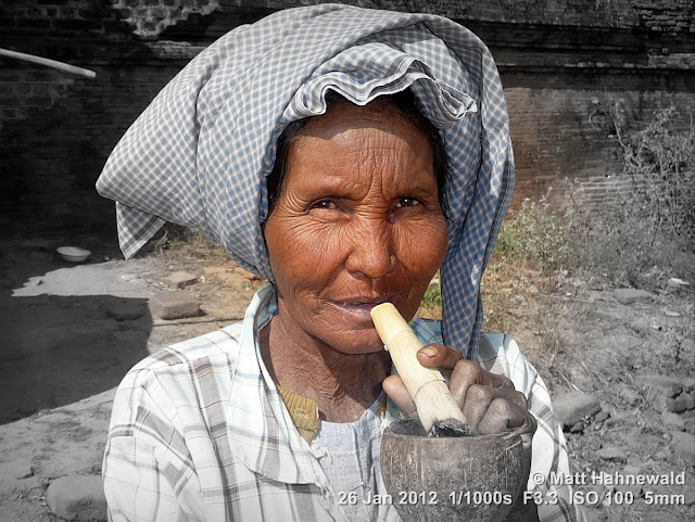 Burma, Myanmar, Bagan, old Burmese woman, people, street portrait, headshot, focal black and white, homemade Burmese cigar