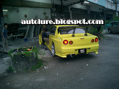 The trademark of Nissan Skyline R34 should be it tail light