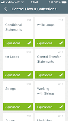 soloLearn screenshot with chapters with green background and white checks.