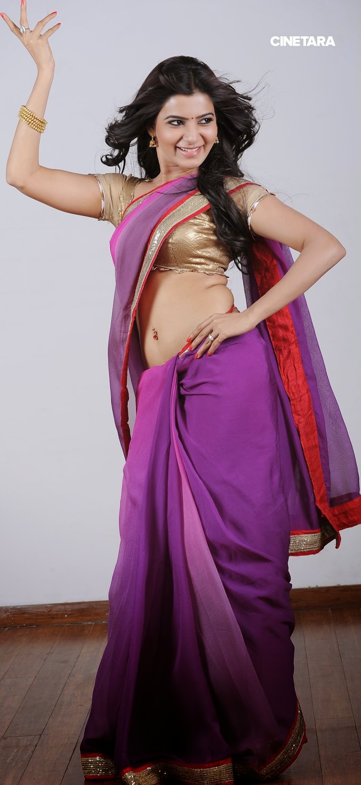 http://cinetara.com/photos/samantha-sexy-stills-in-saree/