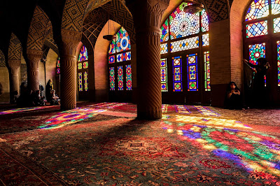 stained glass windows inside a brown building