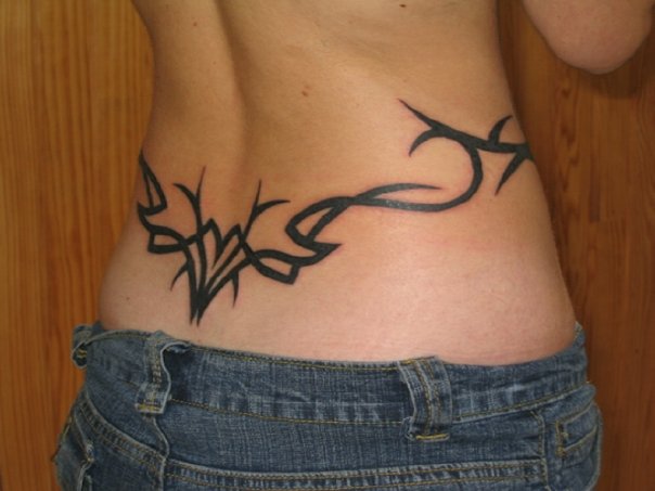 This is Lower Back Tribal Tattoo Design for women and young girls specially