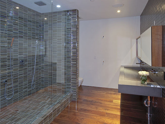 Photo of modern bathroom interiors with big shower cabin 