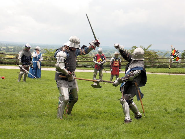 armoured knights sword battle