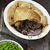 Steak, Guinness and cheese pie with a puff pastry lid
