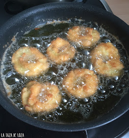 friendo-rosquillas-de-naranja