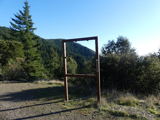 scenery framed by a missing information sign