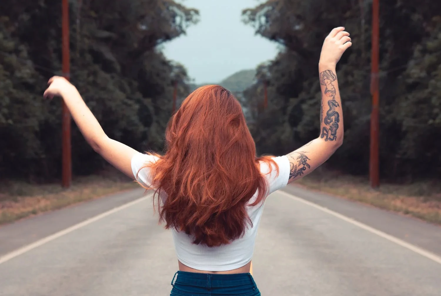 woman with long, ginger hair from the back