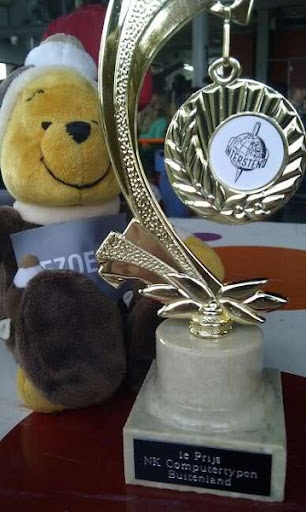 Gouden medaille NK 2012 (met op de achtergrond Winnie de Poeh, die Miche als mascotte gebruikt)