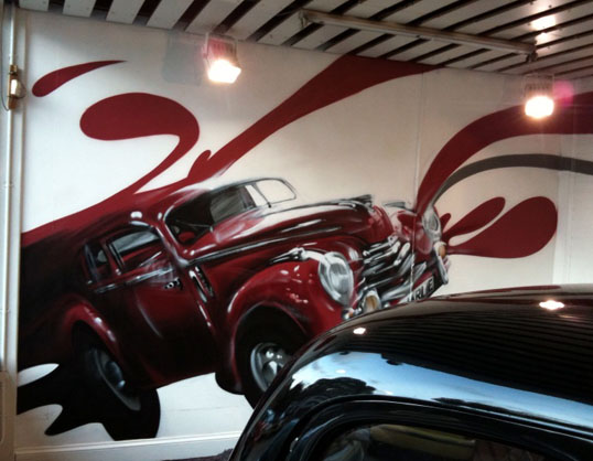 We had the pleasure of painting this bright airy showroom for classic cars