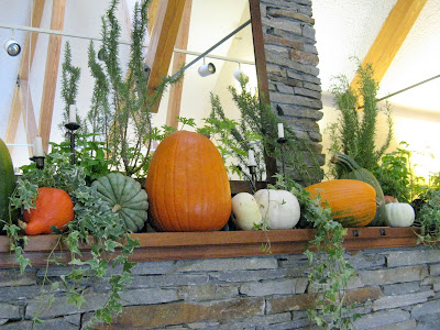 The aisle was lined with herbal clusters of rosemary and bay leaves tied 