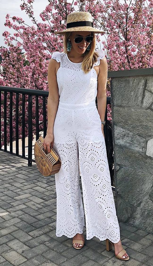 what to wear with a hat : bag + nude heels + white jumpsuit