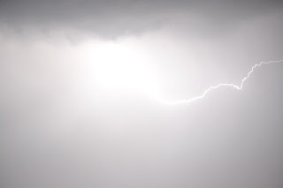 Lightning in grey sky