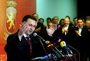 Macedonia's Prime Minister Nikola Gruevski speaks during a press conference in celebration of his party's victory in local elections, in downtown Skopje, Macedonia, early Monday, March 25, 2013.  Macedonians voted peacefully in local elections Sunday, boosting hopes the country is turning a page and won't repeat the political and ethnic violence that has marred past voting cycles. (AP Photo/Boris Grdanoski)