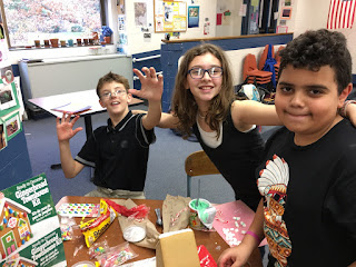 Our 5th Graders Making Gingerbread Houses