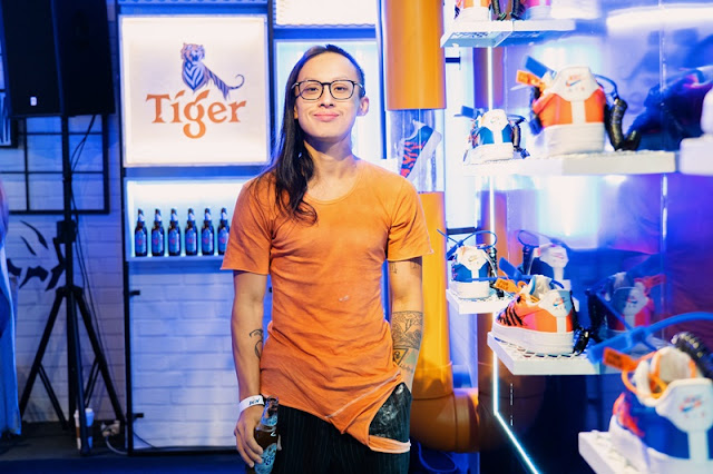 Edmond Looi with his limited-edition shoes collaboration with Tiger Beer at the Tiger Den, at Pavilion Bukit Jalil