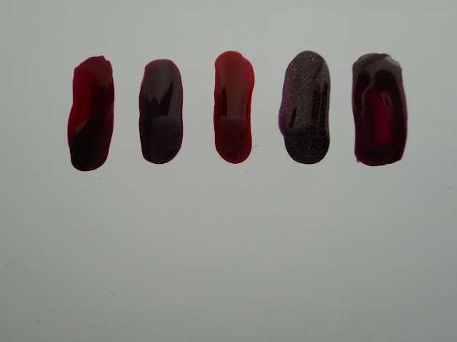 Left-to-right: Jessica #691 Street swagger, Essence #16 well plum!, Korres #59 Dark Red, OPI #926 Stir-fried Eggplant, Erre Due #254 Purple Rain