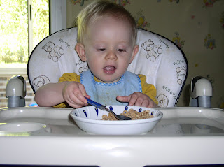 Benjamin eating cereal