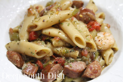 The flavors of a shrimp gumbo with smoked sausage, in a light roux with the trinity of vegetables and okra, tossed with a short cut pasta.