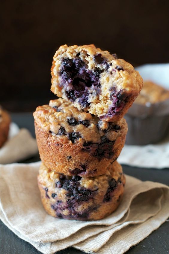 These soft and tender blueberry oat Greek yogurt muffins are made with NO butter or oil! Naturally sweetened and delicious!