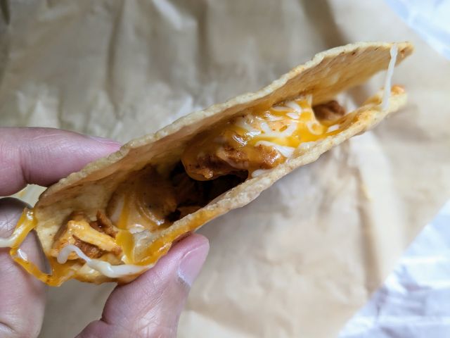 Side view of a Taco Bell Cantina Chicken Crispy Taco.