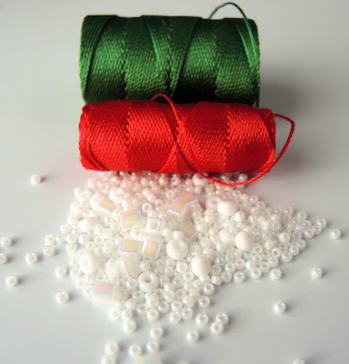 Red and green cord with white seed beads for kits