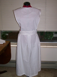 Plain apron with bib, c. 1917-19.