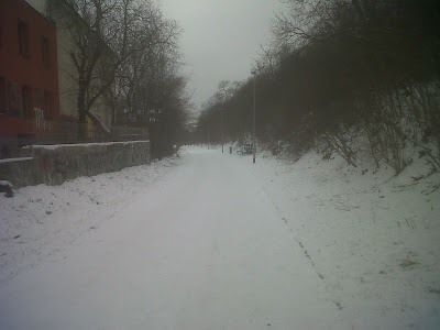 Snow-covered path in Vitkov Park, Prague, Czech Republic