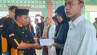 FOKGMAS Asahan Salurkan Bantuan Untuk Anak Didik Madrasah Korban Kebakaran Di Sei Apung.