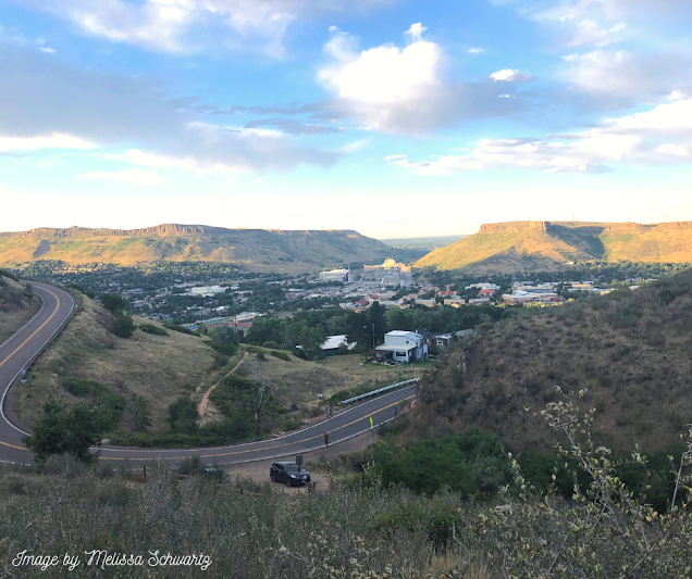 As we ascended Lookout Mountain, we noted the golden sun lighting up the surrounding landscape in the foothills of the Rocky Mountains.