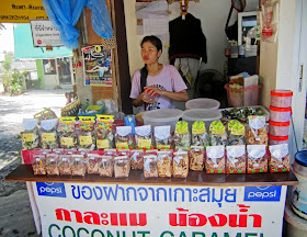 woman vendor selling food on the streets of Koh Samui in Thailand