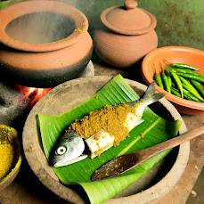 ilish cooking in traditional way