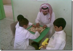 معلم واطفاله