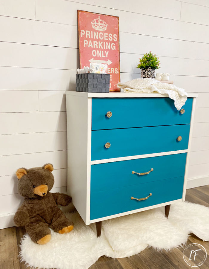 How to upcycle a second-hand dresser into a chic baby change table with mid-century modern style for a fraction of the cost of new nursery furniture.