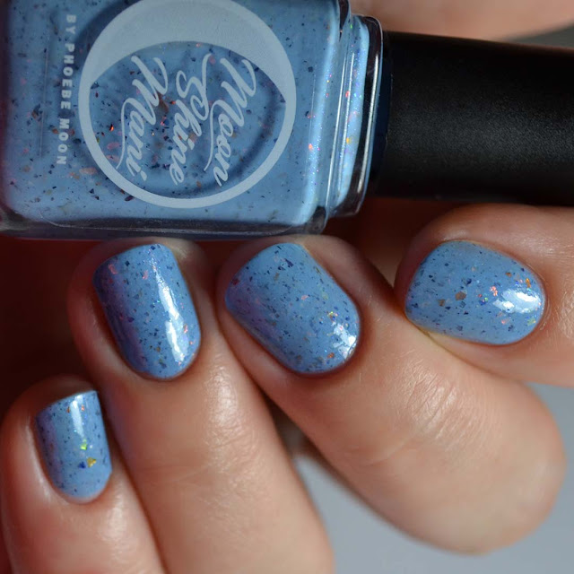 blue nail polish with flakies