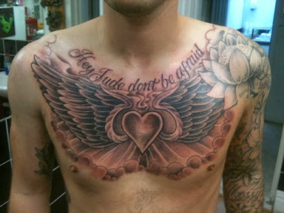 religious tattoos on chest, chest tattoos for men, chest wing tattoos for men, chest tattoos, chest tattoos religious 