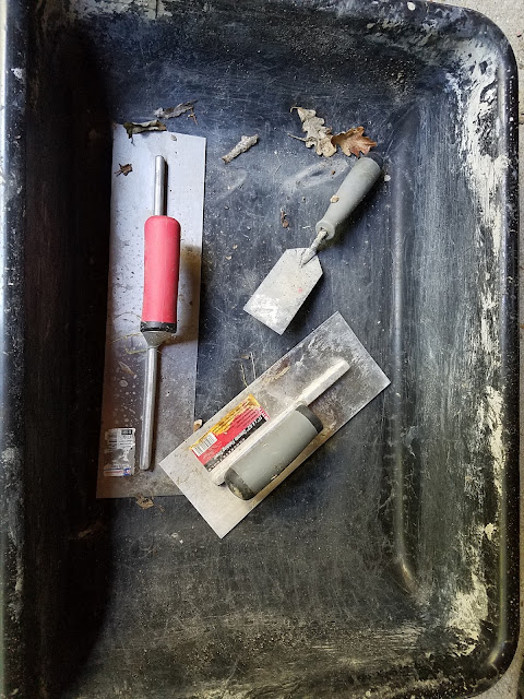 Tools used to form and shape the sauna hot room floor.