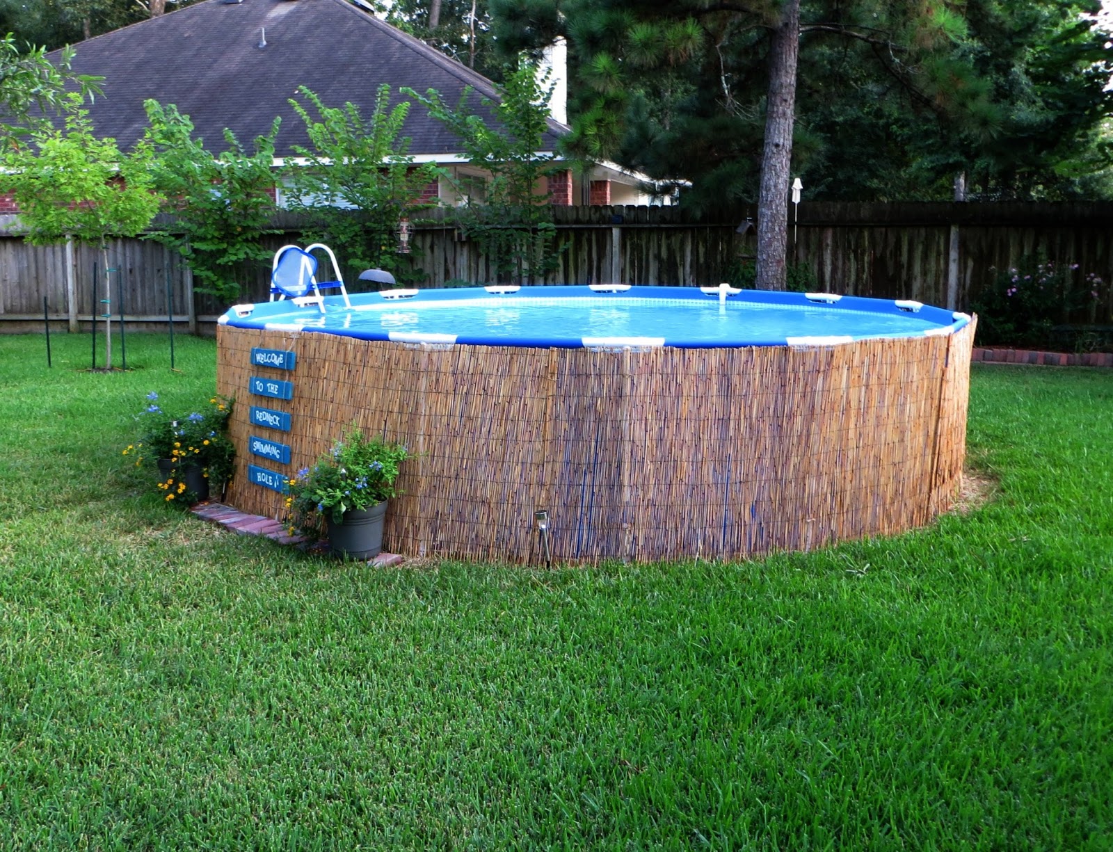 Crafty in Crosby: Easy Pallet Sign and Above Ground Pool Camouflage