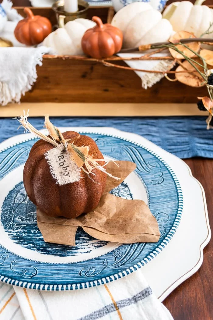 primitive pumpkin on blue and white Thanksgiving table