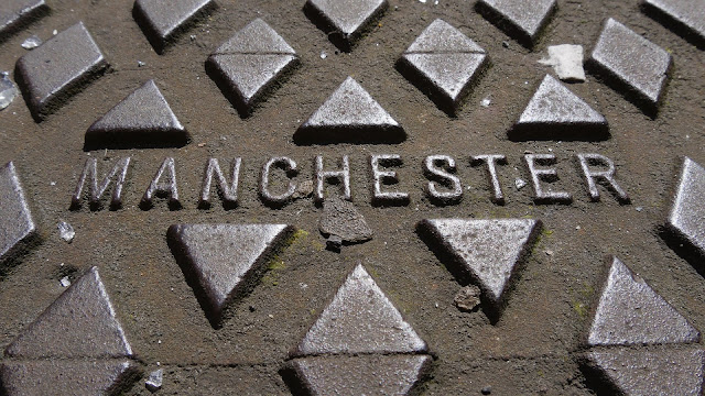 Manchester Man Hole Cover