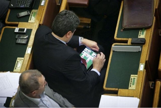 A Politician playing Cards Game on IPAD