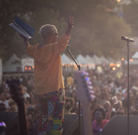 Nikki Giovanni on an outdoor stage