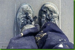 7102441-manual-man-worker-old-shoes-detail-high-view-dirty-pants