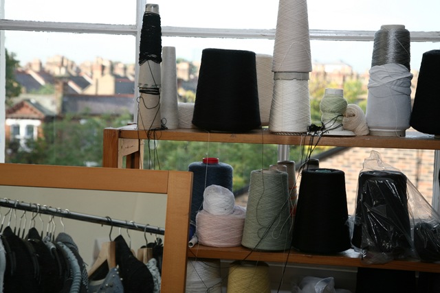 threads, yarns and wool stacked against the window. 