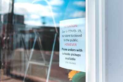 Coronavirus Service Sign at The Doghouse in St. John's - Source: Erik Mclean via Unsplash - https://unsplash.com/photos/0zxe8y3iVa8