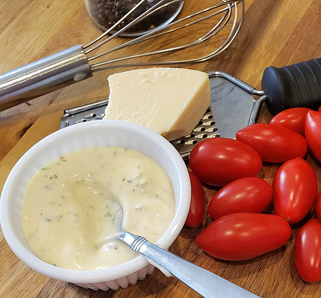 Parmesan Italian cream dressing homemade using a whisk and simple pantry ingredients