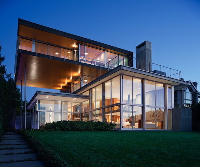 Picture of modern unusual house as seen at sunset from the backyard