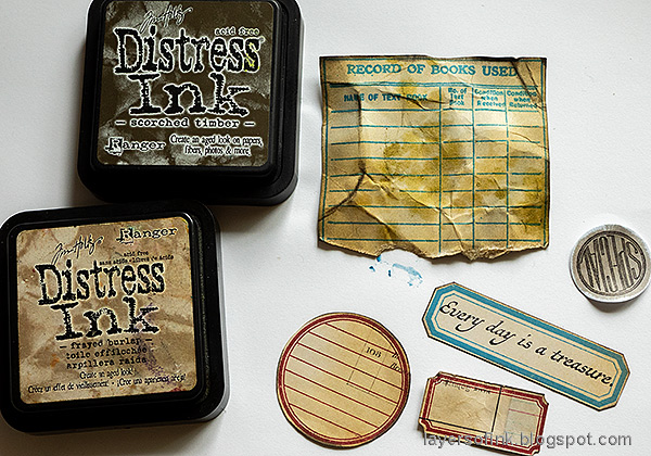 Layers of ink - Vintage Frame Canvas Tutorial by Anna-Karin Evaldsson. Ink the labels with Distress Ink.