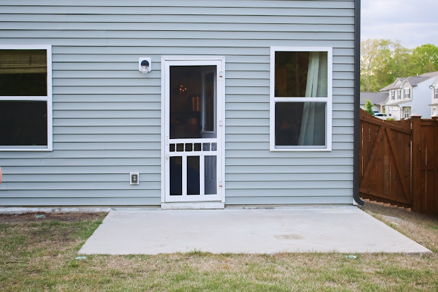 a 10 x 10 cement slab patio in a basic builder home