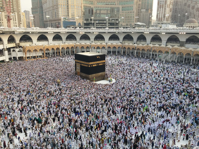 this is  a group of muslims praying after finding qibla
